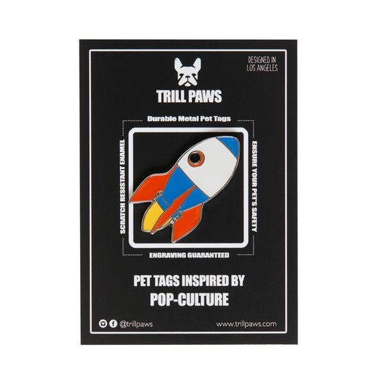red blue yellow grey rocket id tag on black packaging card | Trill Paws 